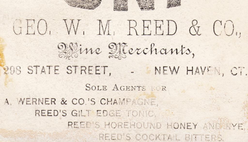 heavily iridized 19th century privy dug antique american square amber bitters bottle with tapered collar manufactured for geo w.m. reed in connecticut.