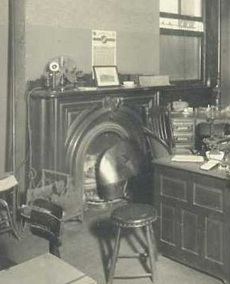 completely refinished brushed ornamental cast iron 19th century american victorian era interior residential fireplace mantel with original shelf