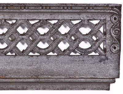 late 19th century perforated cast iron interior rookery building staircase riser panel featuring moorish-inspired intertwined geometric shapes
