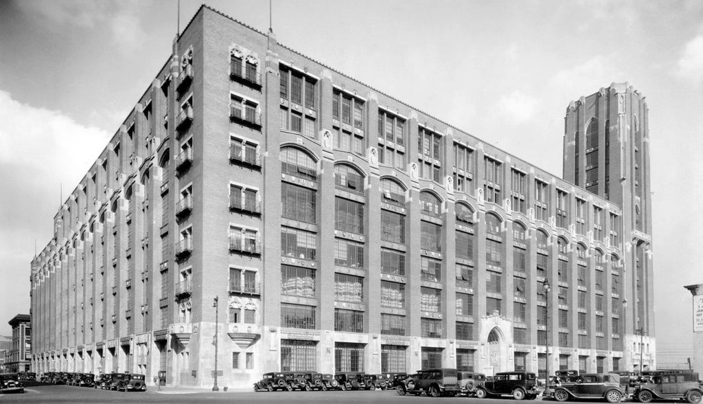 historically important glazed polychrome ornamental terra cotta r.r. donnelley printing plant exterior facade shield with pillar and scroll