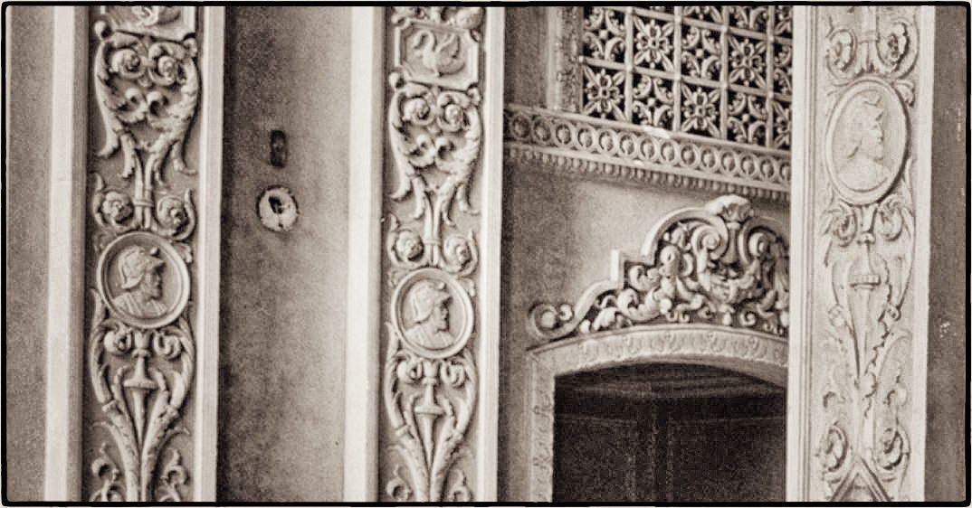 largely intact polychrome enameled cast plaster interior granada theater pilaster rondel or medallion featuring a spanish conquistador in relief