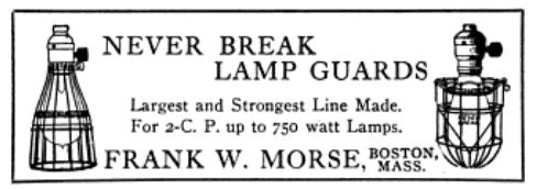 american made early electric industrial hand-held "trouble light" with uniquely shaped oblong steel wire cage or bulb guard