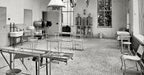 original early 20th century brushed and sanded bare metal antique american medical all welded-joint three-legged stationary operating room stool with original pressed and form seat