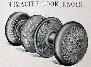 original 19th century antique american ornamented hemacite interior residential passage doorknob with cast iron shank