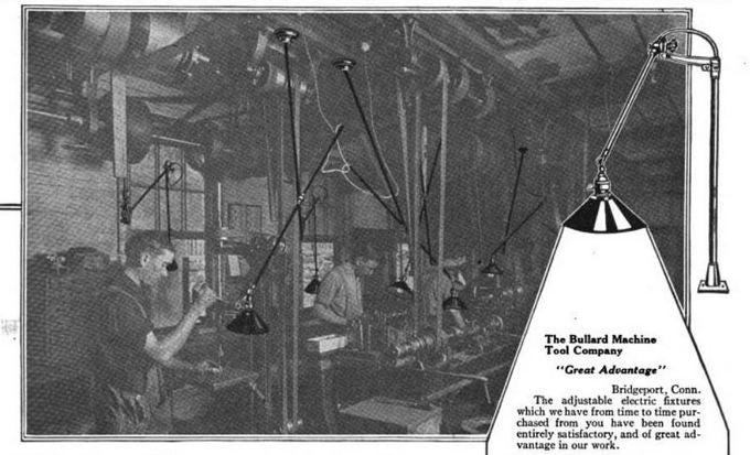 highly desirable early 20th century american industrial black enameled cast iron double arm "white portable" work bench articulating task lamp