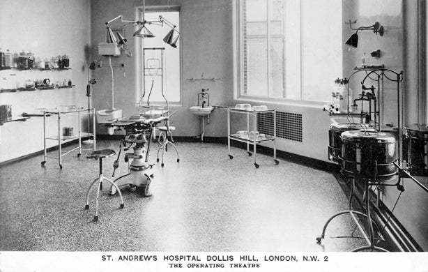 rare and highly sought after antique american medical oversized cast iron and cold-rolled iron hospital surgery room supply cabinet with intact cabriole style legs