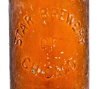 rare and all original american antique late nineteenth century medium amber glass pony style squat blobtop beer bottle fabricated for star brewery of chicago, il.