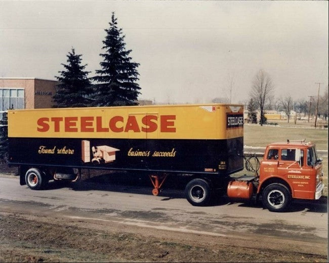 one of two matching original heavy duty cold-rolled steel six-drawer freestanding factory machine shop shelving units with brushed metal finish