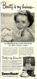 original lightly distressed vintage american industrial "sweetheart" soap mechanical advertising display baby doll head with glass eyes