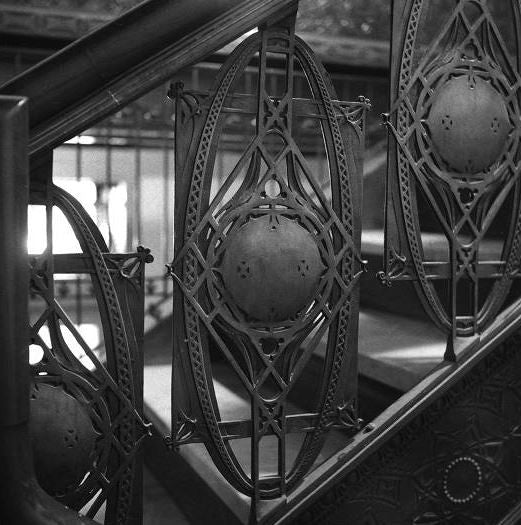 louis h. sullivan-designed late 19th century copper-plated cast iron staircase baluster panel salvaged from the non-extant chicago stock exchange building