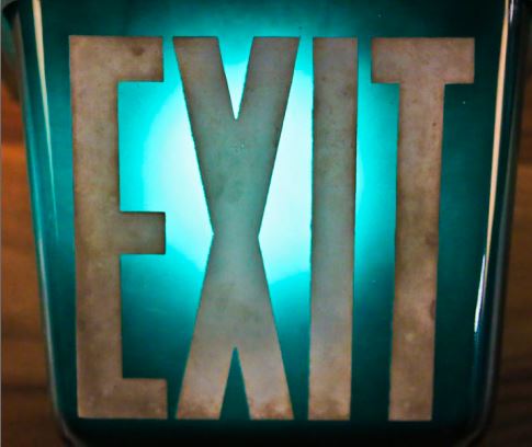original c. 1930's american art deco wedge-shaped dark emerald green illuminated ceiling-mount commercial building exit sign