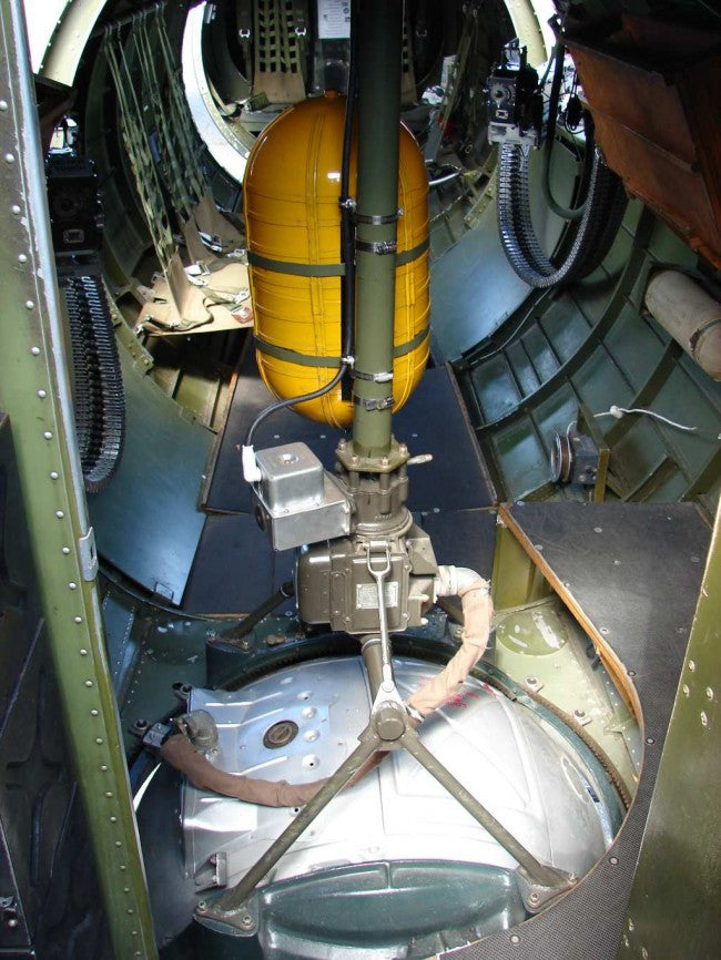 original c. 1940's american industrial yellow painted reinforced aluminum warplane tail gunner "non-shatterable" low pressure oxygen breathing cylinder or tank