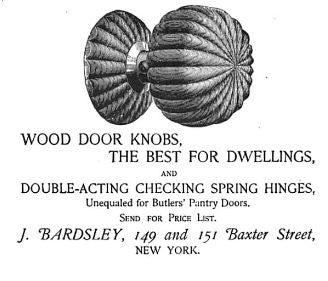 two matching original late 19th century varnished solid oak wood ball-shaped interior residential passage door handles with brass shanks