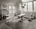 c. 1915 original fanciful cast iron and cold-rolled heavy gauge steel mobile hospital operating room fully enclosed storage cabinet with brushed metal finish