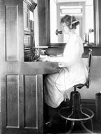 highly desirable fully functional adjustable height salvaged chicago switchboard operator stool with purse bracket
