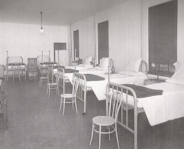 c. early 20th century american intact bedside "murdock" asylum chair comprised of lightweight tubular steel with silver enameled finish