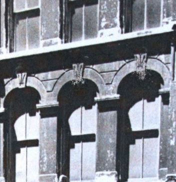 post-chicago fire 19th century exterior hand carved lemont limestone commercial loft building window keystone with abstract floral motif