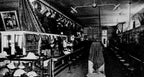 rare and highly sought after nicely aged oversized c. 1905-1910 interior chicago dry goods store 4-arm tubular brass ceiling fixture with original canopy and mica sockets