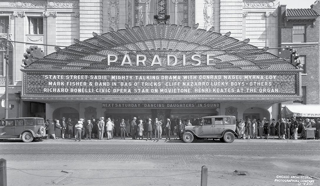 original american depression-era single-sided stamped brass paradise theater (non-extant) hub electric manufacturer plaque with black enameled background