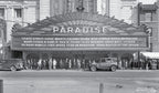 original american depression-era single-sided stamped brass paradise theater (non-extant) hub electric manufacturer plaque with black enameled background