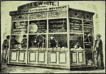 highly sought after early 20th century fully adjustable wall-mount "o.c.white" factory machine shop task lamp with knuckle and wrist joints