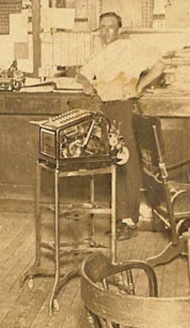 largely intact early 20th century manually operated burroughs desktop model adding machine with beveled glass panels