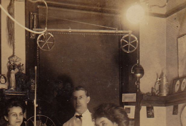 hard to find c. 1918-25 american vintage medical telescoping steel and iron dental cluster light bracket with intact spoked wheels