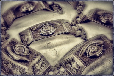group of four all original and highly sought after original 19th century antique american ornamental cast iron "all seeing eye" bin or drawer pulls