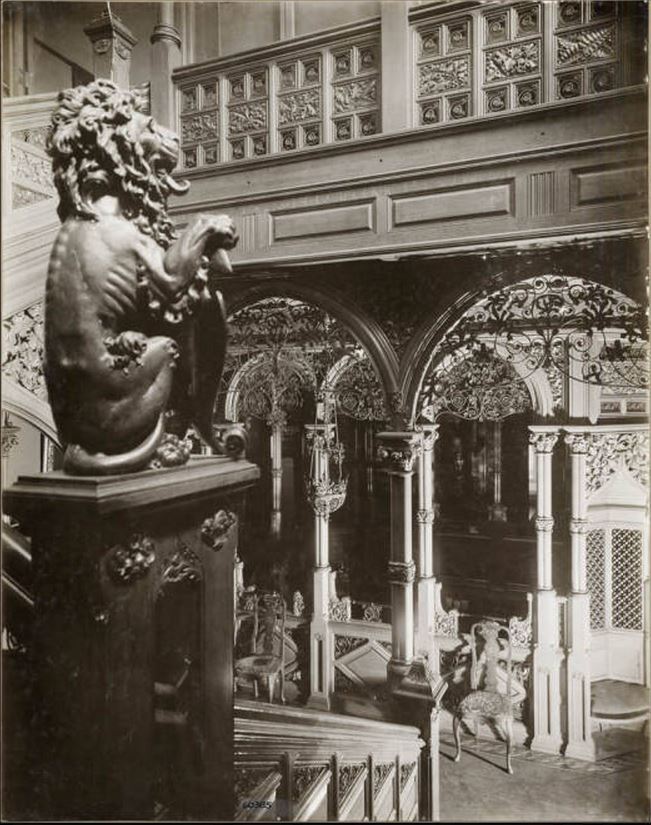 well documented 19th century museum-quality original varnished quartered oak wood and ornamental wrought iron potter palmer mansion angled staircase railing